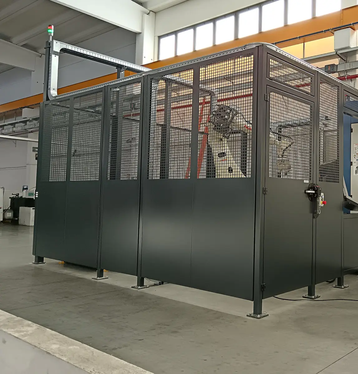 Recinzione di sicurezza attorno a un robot